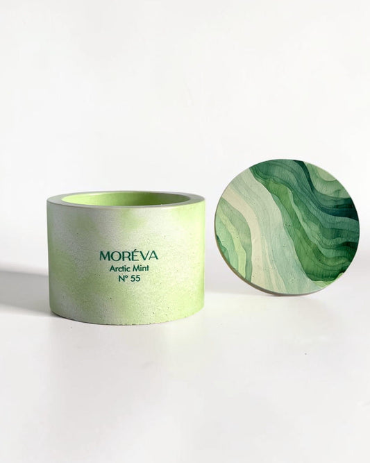 A candle by moreva that smells like fresh mint