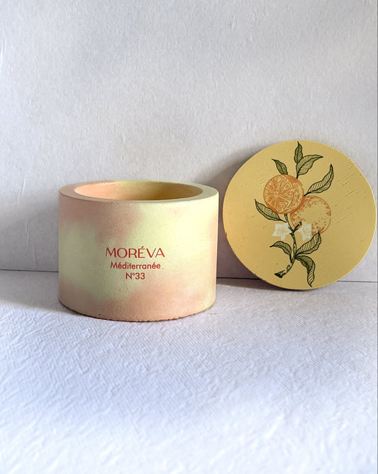scented candle that smells like orange and citrus