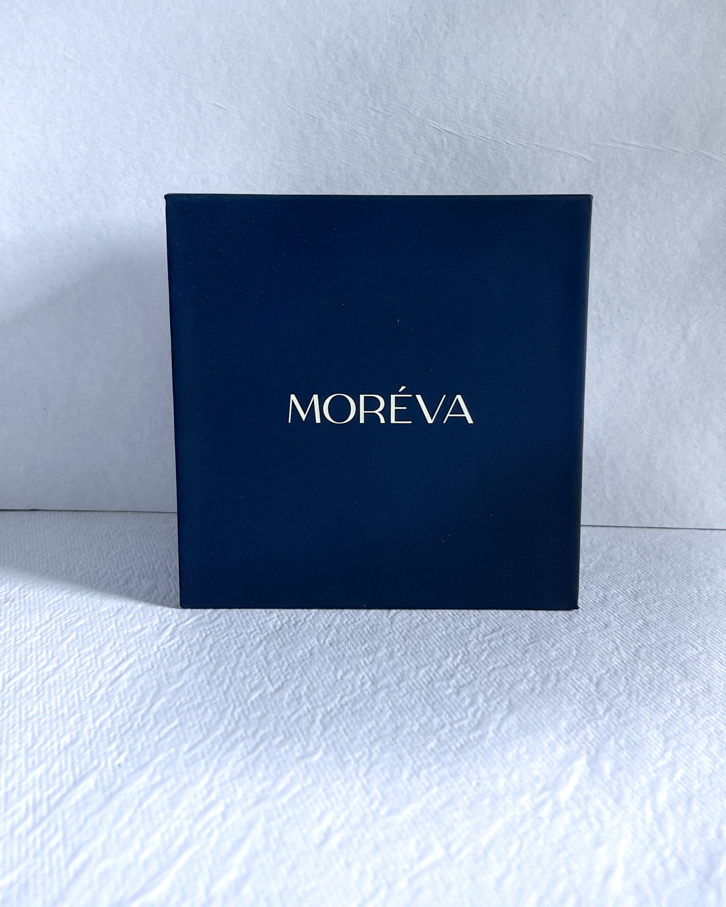 box in which rose scented candle comes